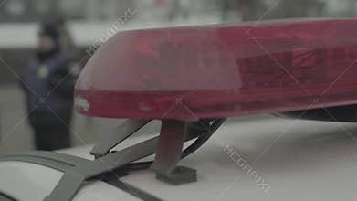 Police officers at the crime scene. Flashing police flasher. Kyiv. Ukraine