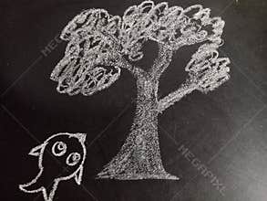 fish climbing on the tree concept displaying on chalkboard concept