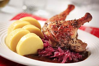Roast duck, red cabbage and potato dumplings