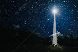 moon shines over the manger of christmas of Jesus Christ.