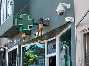 Green cross for a dispensary location in California for sale for of cannabis