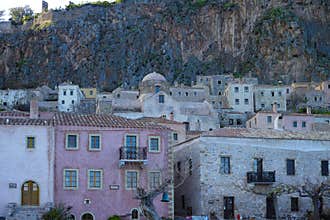Romantic fortified greek village on rock island Monemvasia at sunset