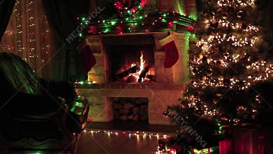 Christmas tree decorated in living room interior with fireplace, armchair, window