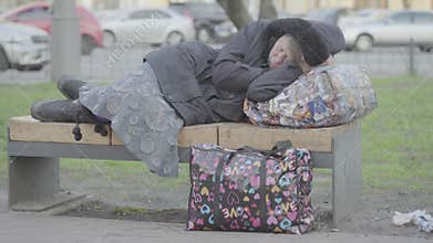 Beggar homeless woman. Poverty. Vagrancy. Kyiv. Ukraine.