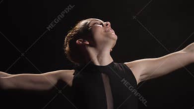 Portrait of actress expressing happiness in dance