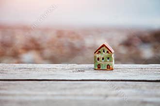 Model of small house as symbol