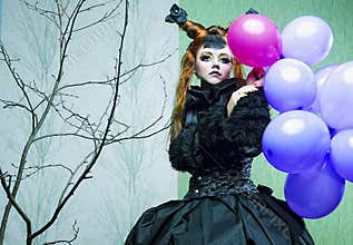 Princess with balloons.