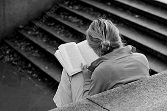 A girl reading a book
