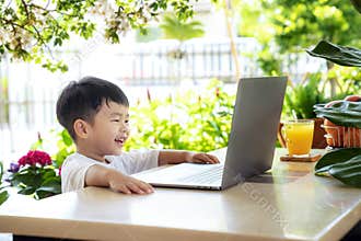Asian boy study by online at home, for prevent covid19 in thailand