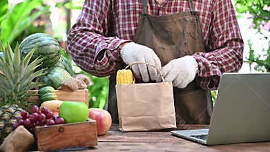 Farmer sell fresh fruit online. Online shopping and home delivery concept. New normal life and business after covid-19.