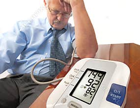 Worried senior man with high blood pressure.