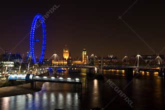 Westminster Palace and London Eye at night