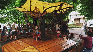 Children's Fete Hendaye Rustic Carousel for children.