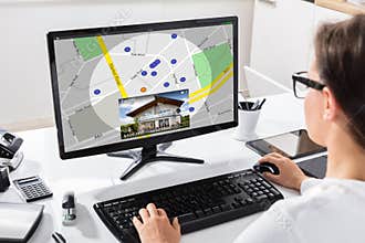 Woman Searching For Real Estate Online