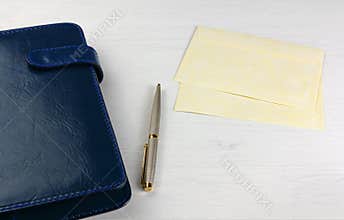 Various Objects on a White Wooden Desk