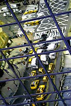 Reflections of New York busy streets