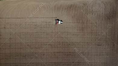Tractor ploughing fields