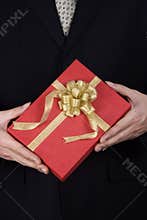 Holding Present