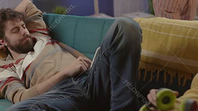 Man chatting and ignoring his girlfriend