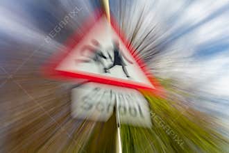 Zoom burst blur effect school warning road sign