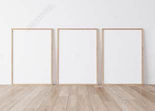 Minimal frame mock up interior, Three wooden vertical frames Standing on parquet floor with white background