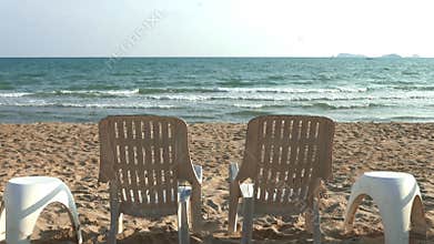 Beach chairs on sand