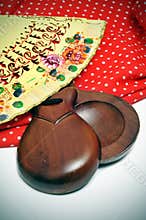 Castanets, fan and flamenco dress