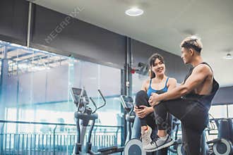 Asian couples exercise before running on the treadmill.Athletic exercises.Metaphor Fitness and workout concept exercise Health