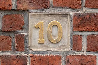 Closeup shot of a number 10 in the wall
