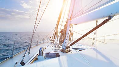 Big sailing yacht boat driving thru the ocean on a sunny day