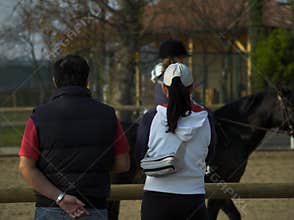 Parents Watching Riding Practice