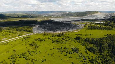 Open pit mine, extractive industry for coal, top view aerial drone