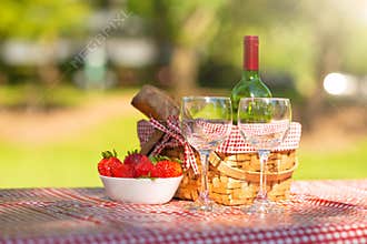Picnic. bottle of wine with glasses. strawberry.romance.banner
