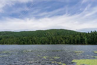Landscape view killarney lake bowen island canada and blue sky.