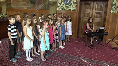 OLOMOUC, CZECH REPUBLIC, APRIL 15, 2018: Choir chorus children singing of the sings Czech old folk song Okolo Hradce
