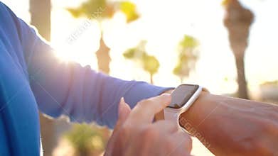 Smartwatch. Woman using smart watch. Closeup of female touching touch screen on watch entering watch app