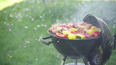 The process of preparation barbecue from chicken meat, vegetables and mushrooms