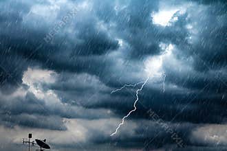 Lightning and thunderstorm flash with raining background. Bad weather and cloudy problem with aerial or satellite signal