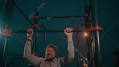 Man exercising at night outside.