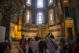 Blue Mosque, tourists take pictures of the interior.