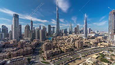 Dubai Downtown skyline timelapse with Burj Khalifa and other towers paniramic view from the top in Dubai