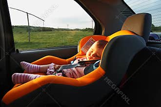 Baby sleeping in the car