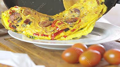 Woman cooking breakfast