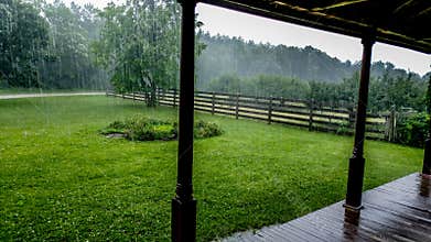 Front Porch with Rain Pouring Down