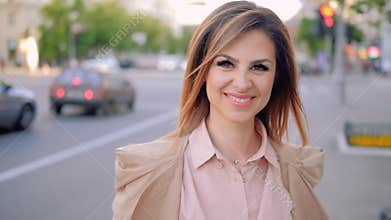 Urban woman portrait confident smiling woman city