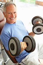 Senior Man Working With Weights