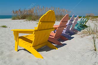 Wooden chairs on beach