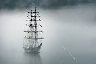 Sailboat and foggy weather