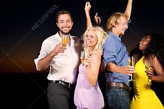 Party and dancing at the beach