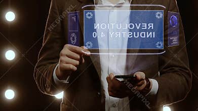 Businessman shows hologram Revolution Industry 4.0